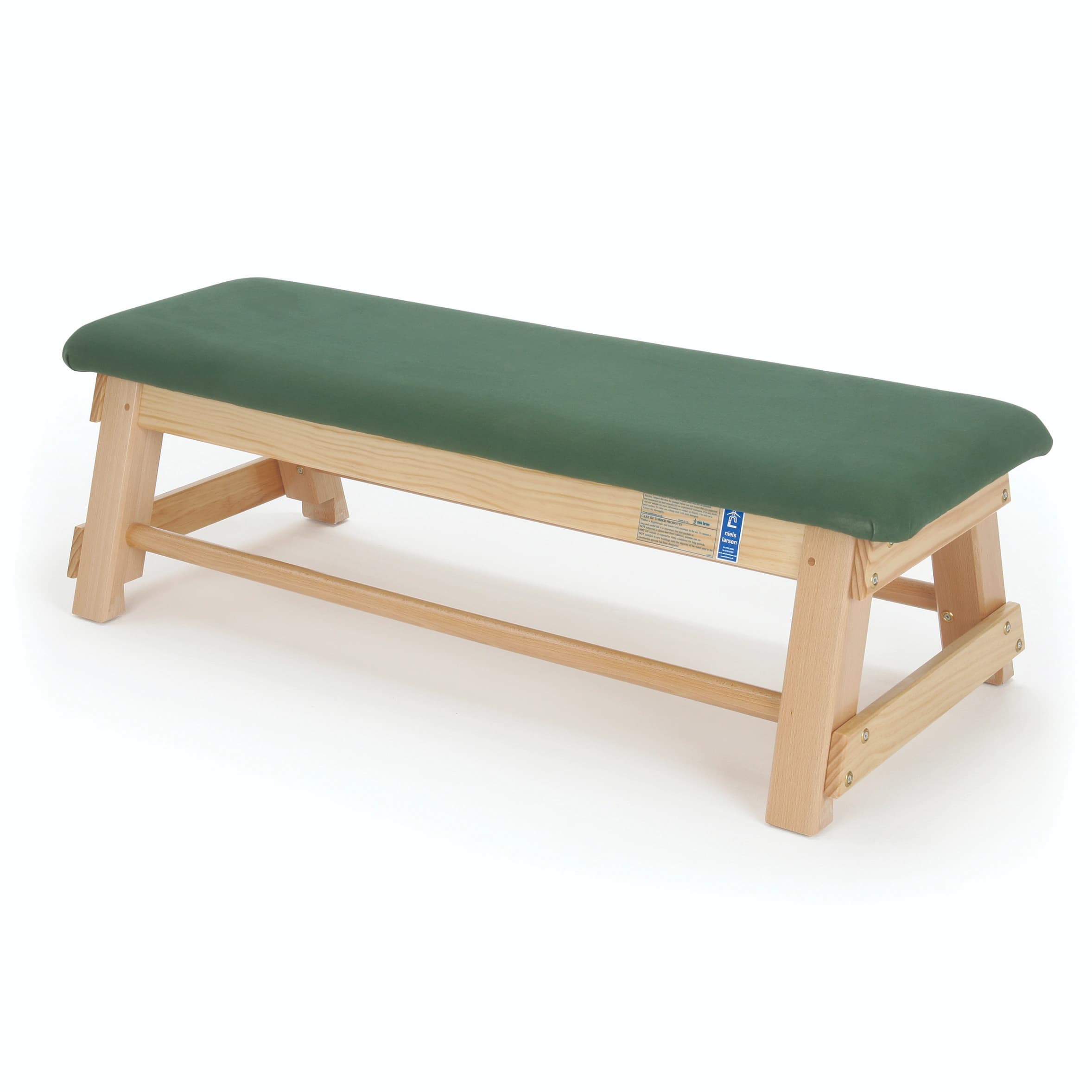 Light wood bench with a green quality hide top, interlocking corner blocks, and castors.